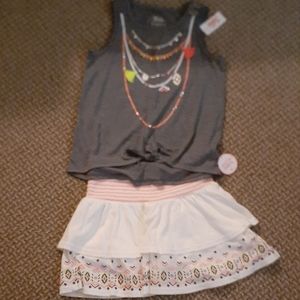 Girl's Justice Outfit NWT. Size 10 has a necklace built into the top. Super Cute